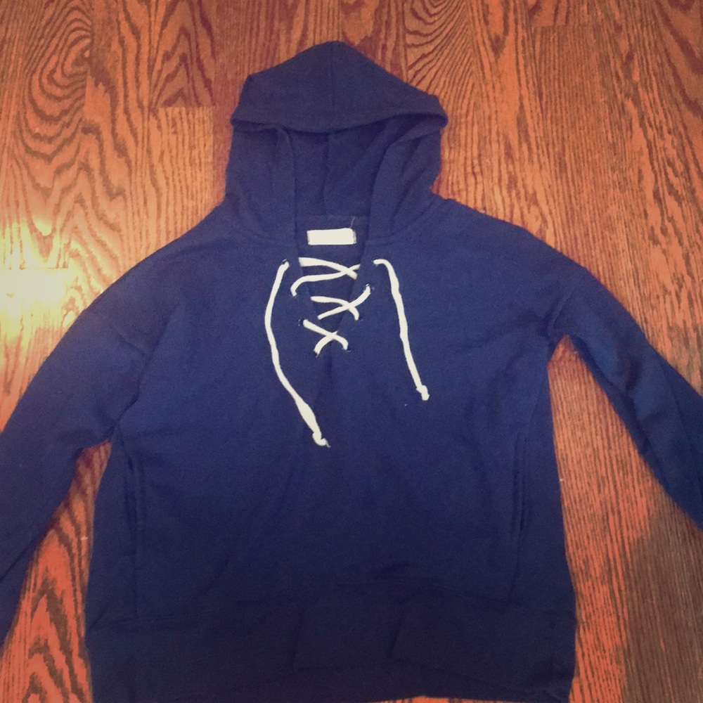 A blue lace up sweatshirt